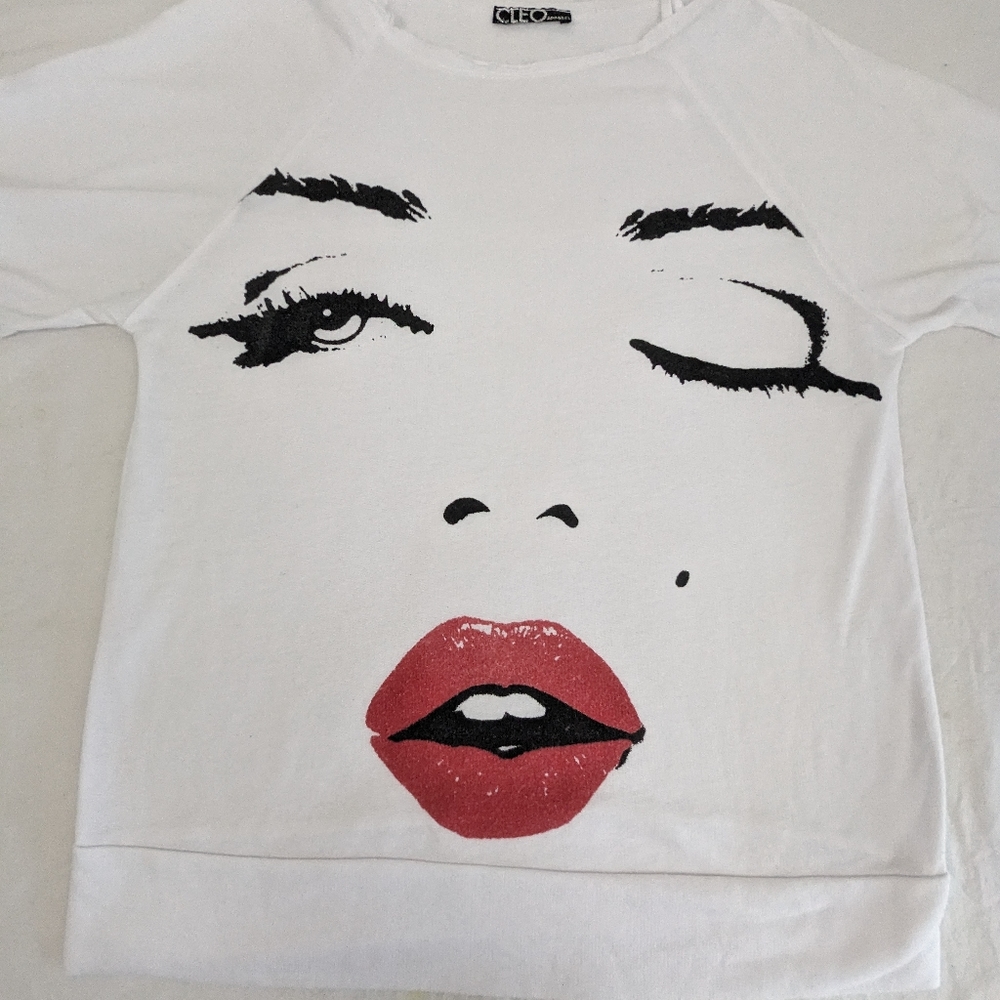 Chic White Graphic Top with Red Accents